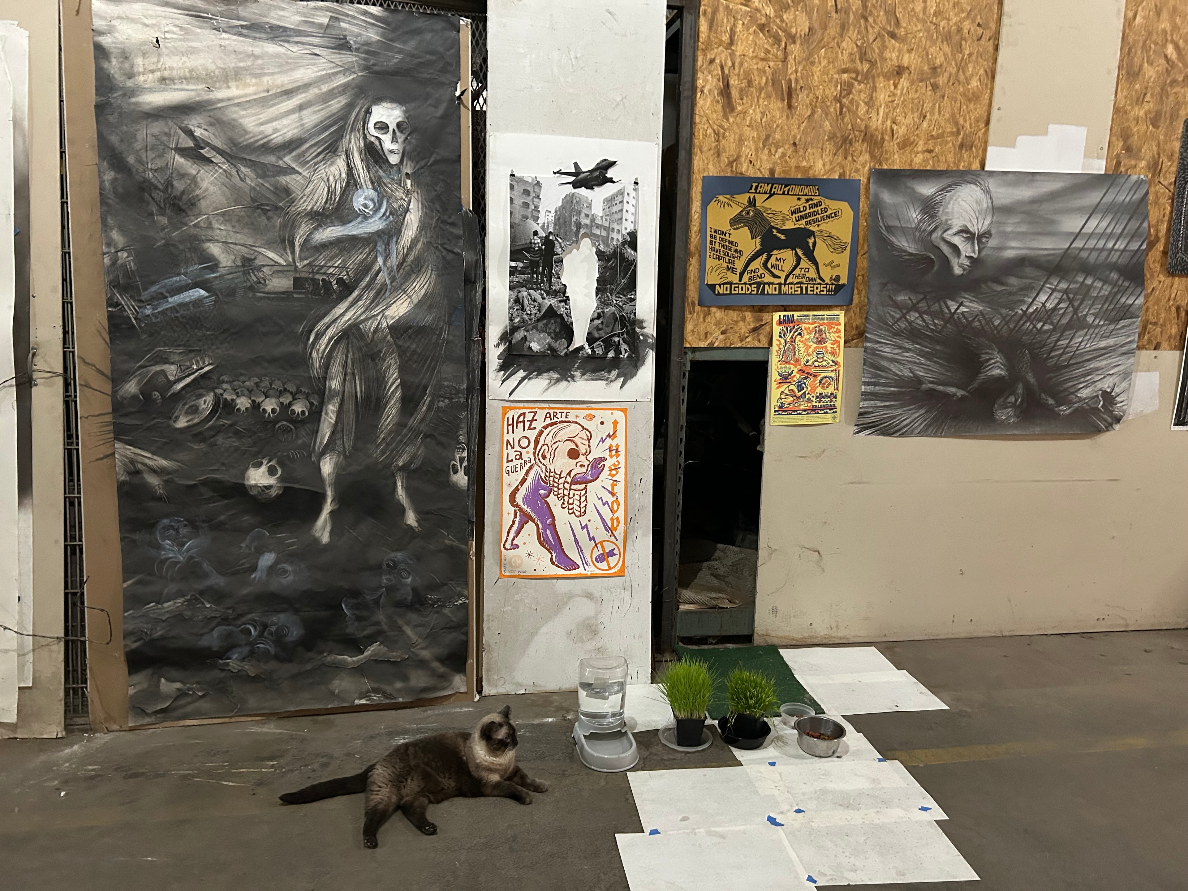 Kitty the Studio Cat — Ricardo's companion and constant presence in the studio. Every great artist has a witness.